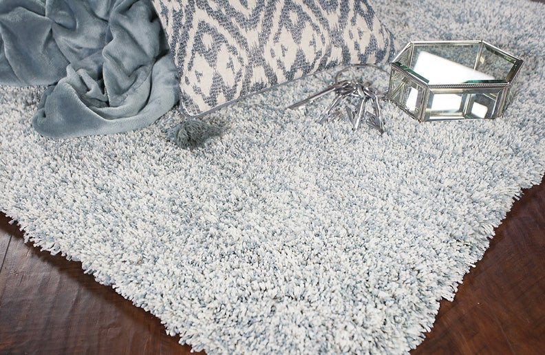 shag off white rug at an angle