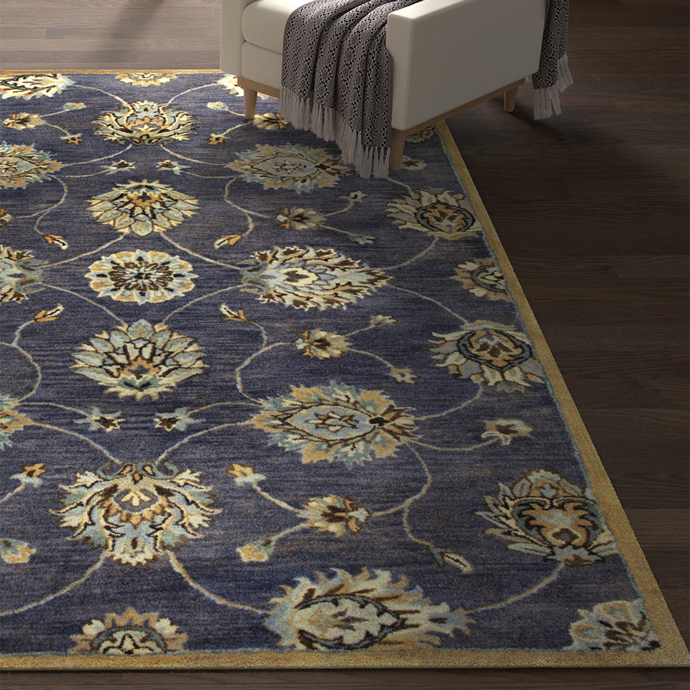 tradtional low pile flower pattern rug in blues and yellow